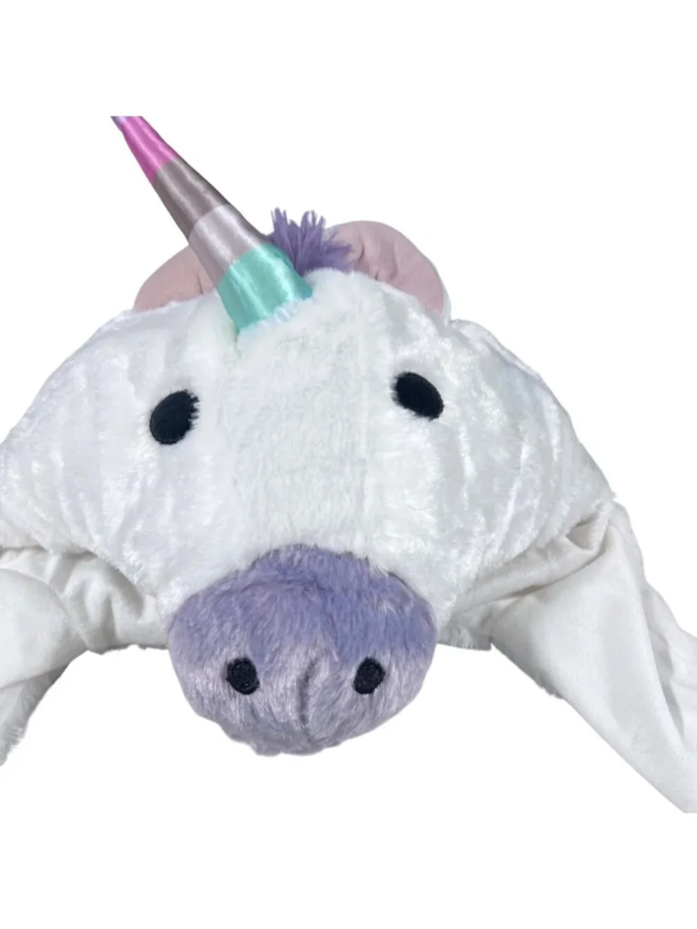 Plush Unicorn Hat with pom-pom ear flaps, whimsical, fun, playful